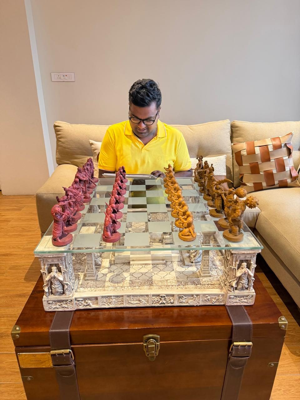 A collector at home with the Battle of Kurukshetra artefact